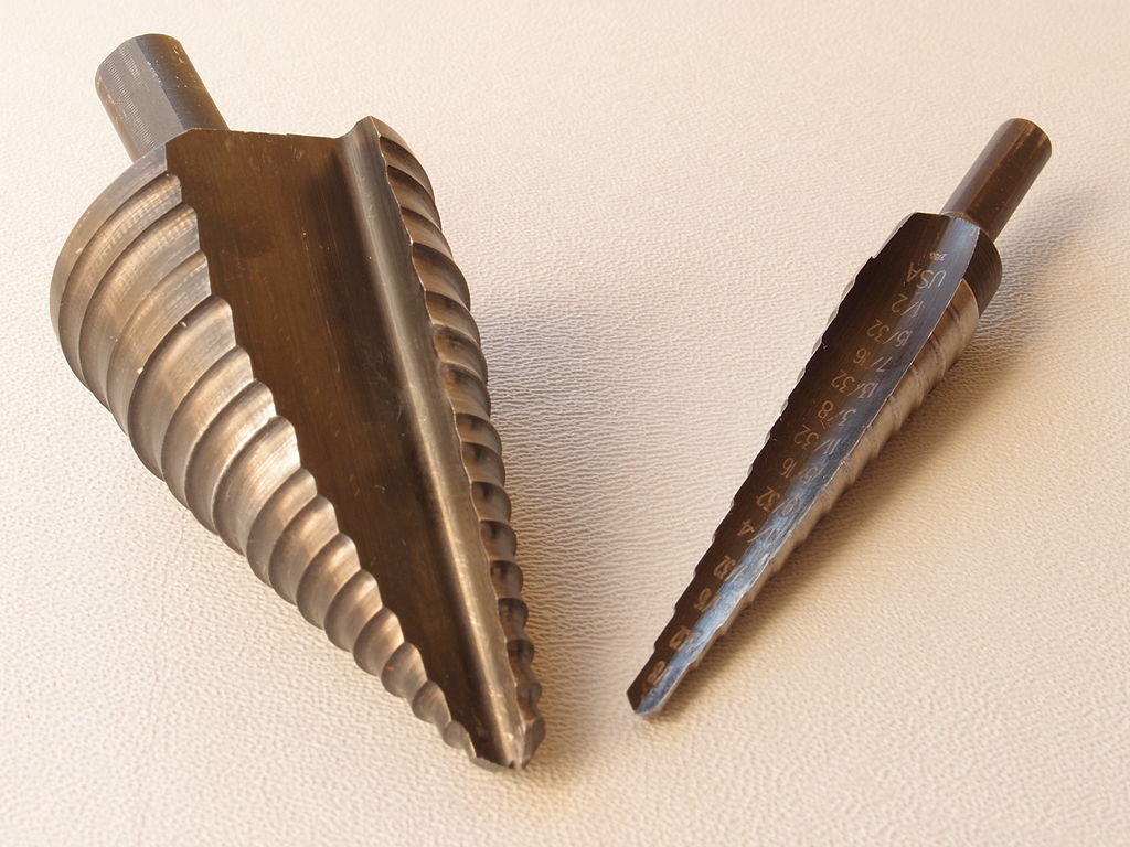Pair of step drill bits.